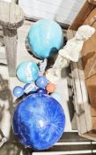 Collection of garden ornaments including a composite stone statue, 68cm high, eight glazed balls and