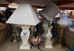 Brass framed oval swing mirror, 56cm high and nine table lamps, one in the form of a Victorian oil