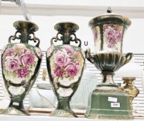 Early 20th century St Louis Artware ceramic mantel garniture, comprising a central lidded urn