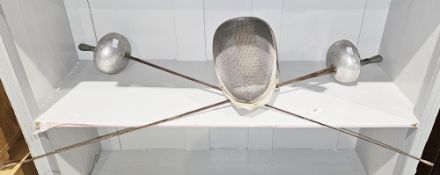 Pair of fencing foils and a fencing mask