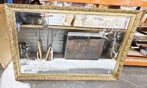 Large gilt-effect framed rectangular mirror, the plate with engraved floral decoration, 134cm x 88cm
