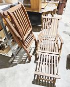 Two garden teak steamer-type folding lounge chairs with slatted backs and seats, 90cm high x 167cm