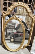 Two modern wall mirrors with gilt-effect frames, one shaped, one oval, largest 102cm high (2)