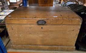 19th century pine blanket box with hinged lid, wrought iron handles, on a plinth base, 44cm high x