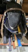 Collection of approx 13 tennis rackets including Head, Destiny, Mizuno and others, in a wicker