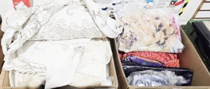 Assorted table linen to include Maltese-style cut thread tablecloth, embroidered tablecloths, a