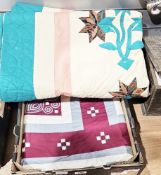 Modern quilted bedspread, yellow ground bordered with orange and turquoise, with bold floral design,