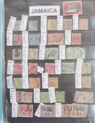 Jamaican stamps: Two folders mint and used definitives & commemoratives, QV-QEII, with higher values