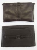 Brown leather mid-century clutch bag with various compartments including an inner purse, attached
