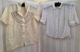 A selection of vintage blouses, early 20th century, to include white muslin with embroidery, apricot