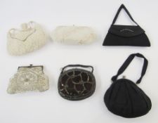 Various mid-century evening bags to include a black suede bag with diamante detail, the handle