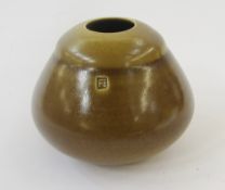 Sara Flynn (Irish 1971), Porcelain vase, circular and tapered with brown ochre glaze, 9cm high x