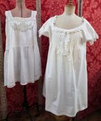 A 1920's nightgown or petticoat, with lace shoulders and detail to the square neck and bodice,