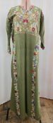 Three embroidered kaftan style full length robes, green, embroidered in petite pointe to the bodice,