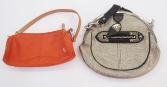 Alexander McQueen circular silvered leather bag with silver-coloured metal fixed frame, zipped