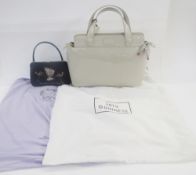 Lulu Guinness patent leather handbag, zip fastening with 'lipstick' charms on the two way zip, inner