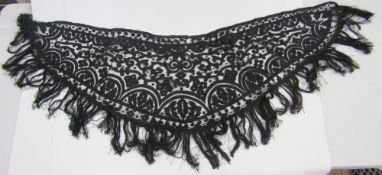 Black Victorian shawl, ribbon work on a black net ground with a deep fringe