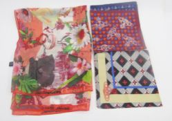 Vivienne Westwood scarves - one dark blue and orange with her 'Orb' logo in cream, another with