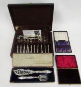 Victorian cased pierced silver-plated serving knife and fork, rocaille cast handles, a Viners