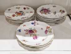 Composite set of Meissen dinner plates, circa late 18th/19th century, blue crossed swords dot marks,