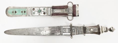North Africa Tuareg Telek arm dagger having a white metal and brown and turquoise green leather hilt