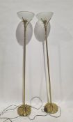 Pair of modern gilt metal uplifter floor lamps with frosted glass shades, 179cm high