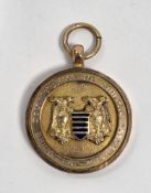 9ct gold and enamel sporting medallion by Thomas Fattorini, Hockley Street, Birmingham, 10g approx