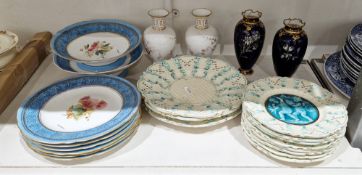 Pair of Royal Crown Derby bone china dark blue ground oviform vases, enamelled in gilt with