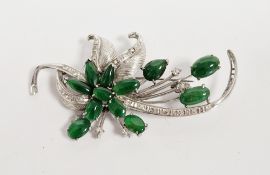 LOT WITHDRAWN White gold spray brooch set with polished oval jade cabochons and eight cut