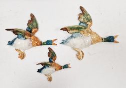Set of three Beswick pottery duck wall plaques in sizes, printed and impressed marks (damages and