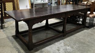 Large oak refectory-style dining table in the 17th century manner, the three-plank top on six turned