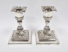 Pair of Victorian silver candlesticks by Henry Wilkinson & Co, London 1893 of knopped form, on