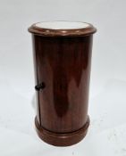 19th century mahogany bedside cabinet of cylindrical form, the marble top over a plain body with
