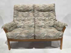 Ercol pale elm framed Saville Range two two-seater sofas and an armchair, upholstered in a cream
