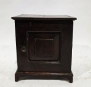 18th/19th century oak table-top cabinet, the single moulded panel door opening to an interior fitted