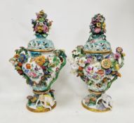 Pair of large Meissen flower-encrusted pot pourri vases and covers,  circa 1880, blue crossed swords