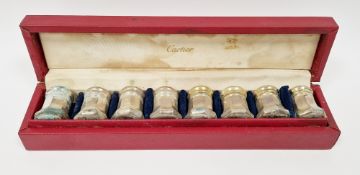 Set of eight silver individual pepperettes by Cartier, each marked sterling to base, each of