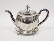 George III silver teapot by Thomas Hayter, London 1807, of shaped oval form with engraved diaper