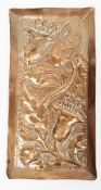 Arts and Crafts copper small tray with repousse decoration of flowers, leaves and the initial N (