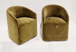 Pair of Alto tub dining chairs designed by Andrew Martin, upholstered in an olive green velvet, on