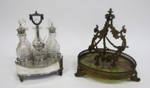 Victorian condiment or cruet set, the silver plated stand by Hukin & Heath holding six faceted glass