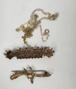 Two late 19th / early 20th century 9ct yellow gold bar brooches, one set with a wishbone and the