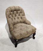 Early 20th century nursing chair, upholstered in pink fabric, on turned tapering legs with