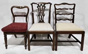 Three mahogany chairs including a Chippendale-style chair with drop-in upholstered seat, a George