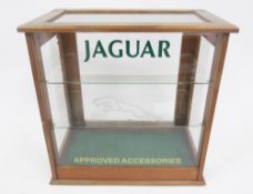 Wooden table top glazed advertising style display cabinet, later sign written ' Jaguar, Approved