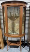 Edwardian mahogany inlaid demi-lune display cabinet, the single door opening to a fabric lined