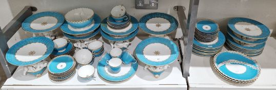 English porcelain turquoise ground composite part tea and dessert service in the Minton style,