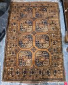 Large green ground rug with two rows of four elephant foot guls, multiple geometric borders, 202cm x