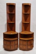 Pair of mid-century Nathan Squares teak tall corner cabinets, each comprising two shelves widening