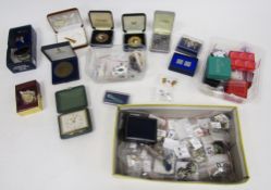 Collection of costume jewellery earrings together with other items including a travel clock and